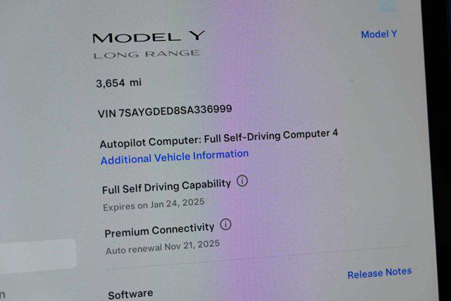 used 2025 Tesla Model Y car, priced at $38,987