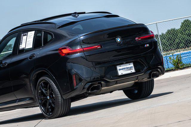 used 2023 BMW X4 car, priced at $54,987
