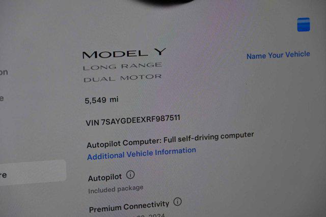 used 2024 Tesla Model Y car, priced at $39,554