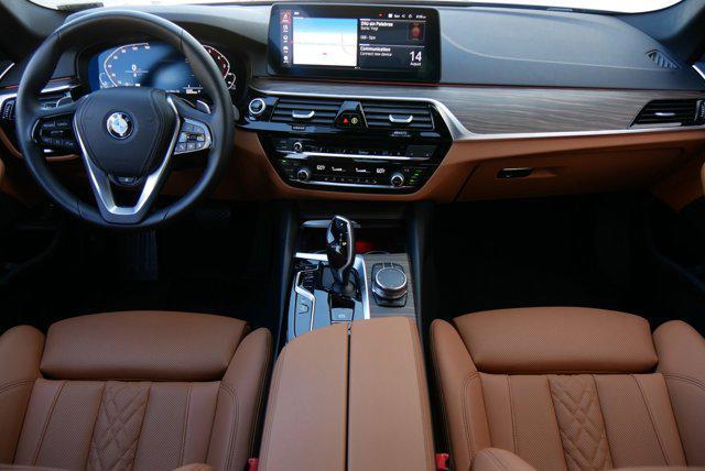 used 2023 BMW 530e car, priced at $49,814