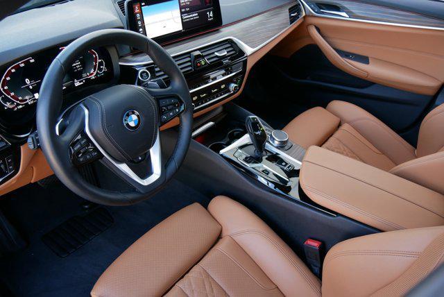 used 2023 BMW 530e car, priced at $49,814