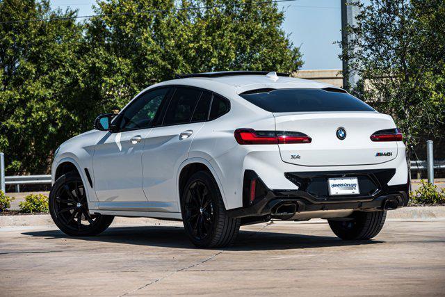 used 2023 BMW X4 car, priced at $60,987