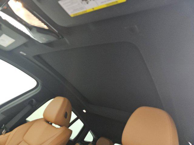 used 2025 BMW X4 car, priced at $53,987