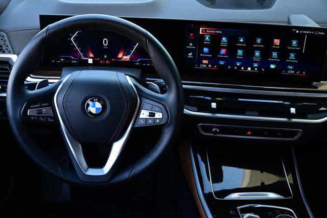 used 2025 BMW X5 car, priced at $66,987