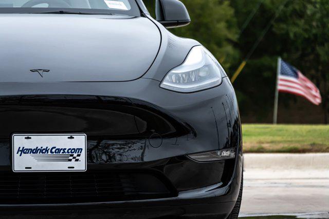 used 2025 Tesla Model Y car, priced at $39,897