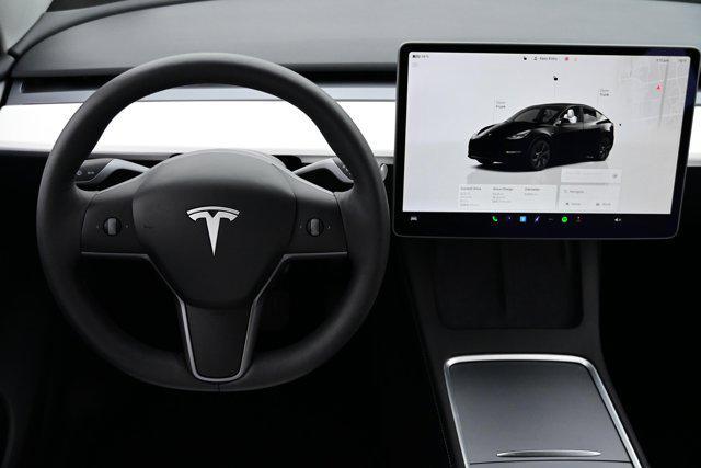 used 2025 Tesla Model Y car, priced at $39,897