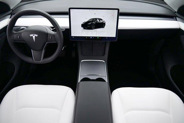 used 2025 Tesla Model Y car, priced at $39,897