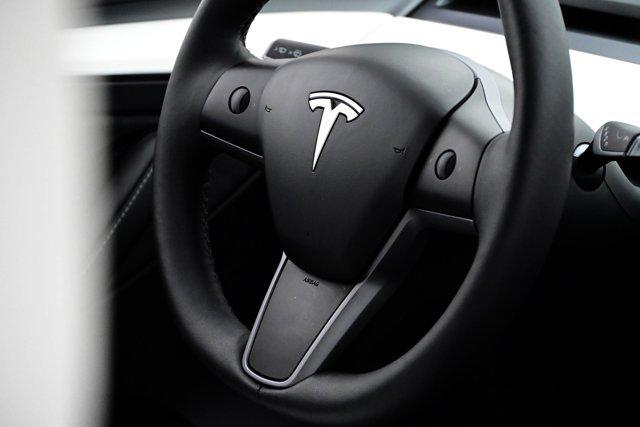 used 2025 Tesla Model Y car, priced at $39,897