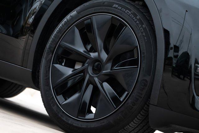 used 2025 Tesla Model Y car, priced at $39,897