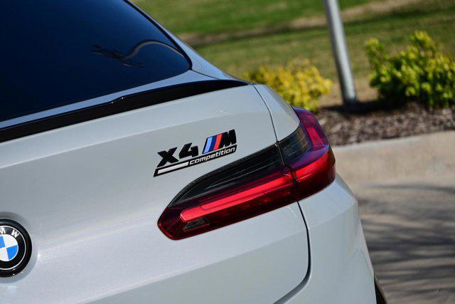 used 2023 BMW X4 M car, priced at $76,877