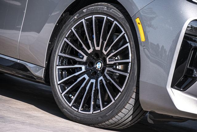 new 2025 BMW 740 car, priced at $110,575