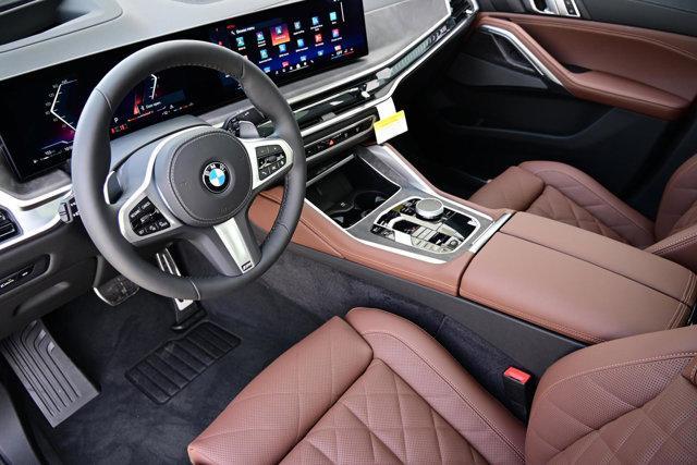 new 2025 BMW X6 car, priced at $85,175