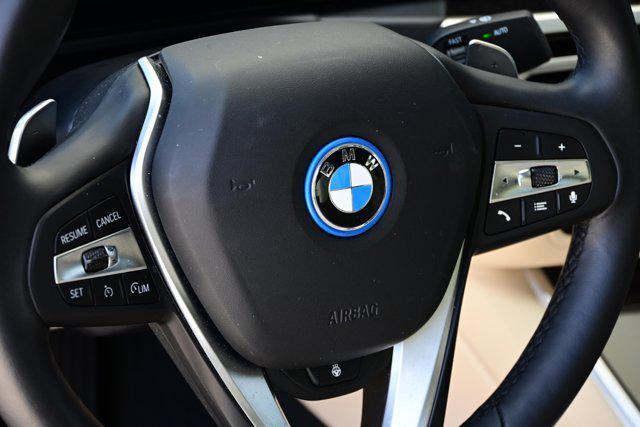 used 2023 BMW 330e car, priced at $37,987