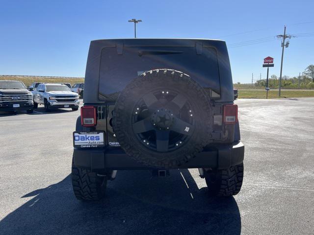 used 2011 Jeep Wrangler Unlimited car, priced at $16,500