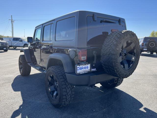 used 2011 Jeep Wrangler Unlimited car, priced at $16,500