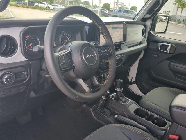 used 2024 Jeep Wrangler car, priced at $35,300