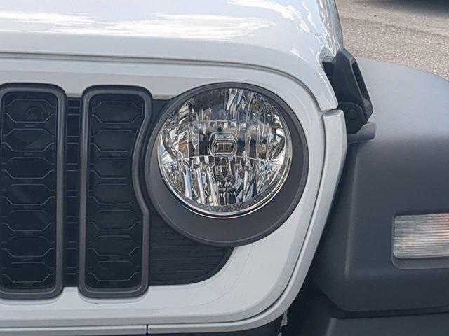used 2024 Jeep Wrangler car, priced at $35,300