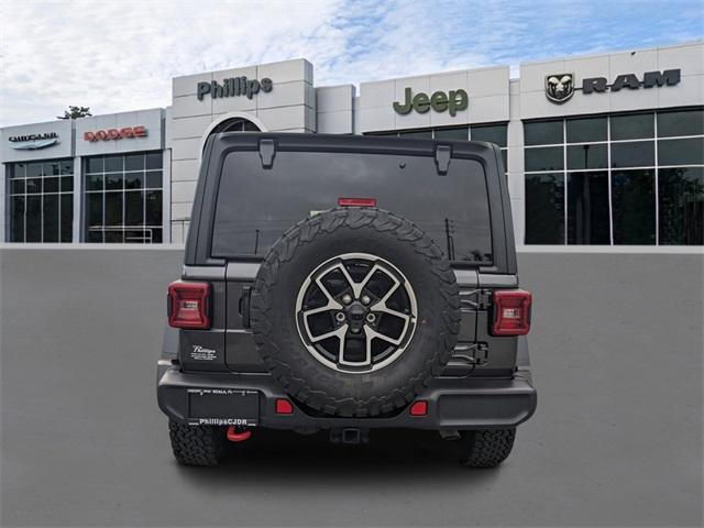 used 2024 Jeep Wrangler car, priced at $52,997