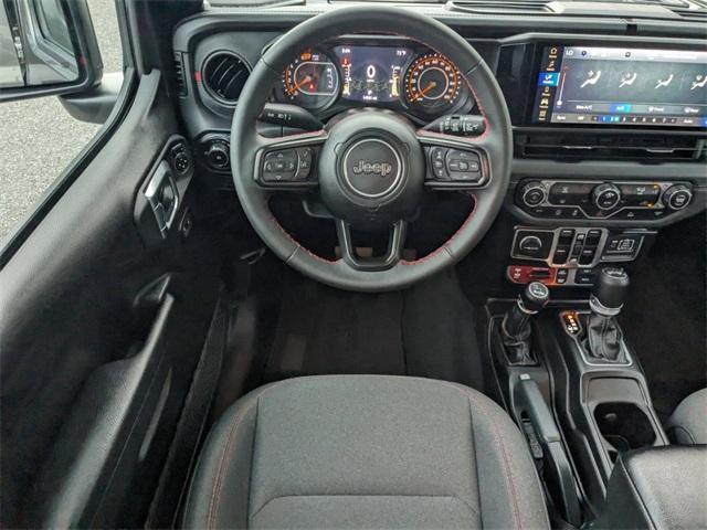 used 2024 Jeep Wrangler car, priced at $52,997