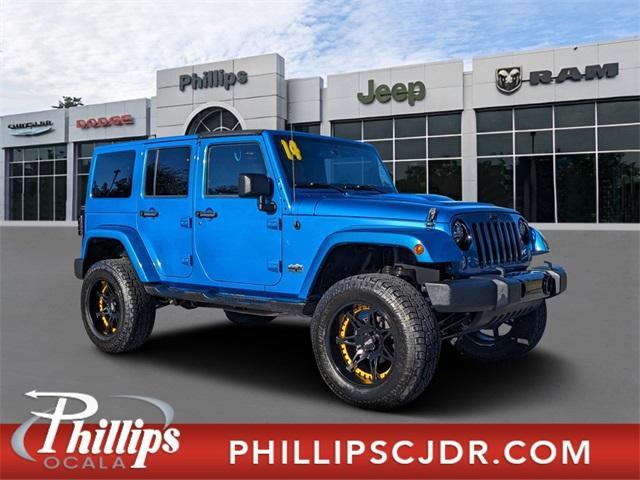 used 2014 Jeep Wrangler Unlimited car, priced at $21,992