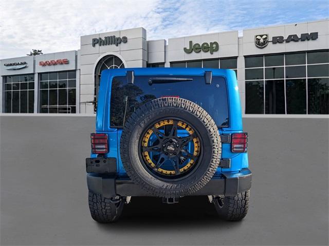 used 2014 Jeep Wrangler Unlimited car, priced at $21,992