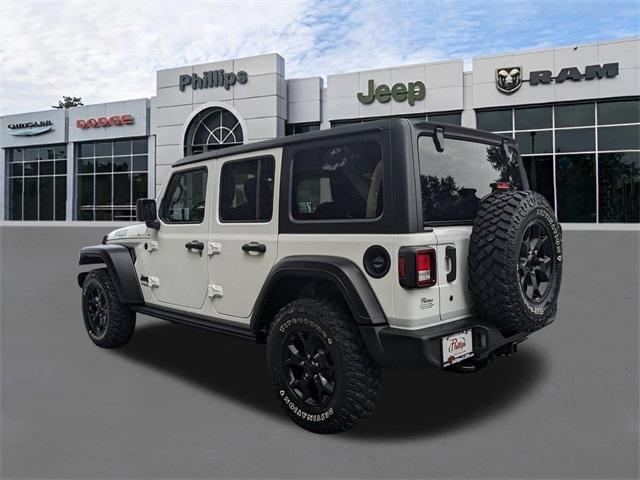 used 2021 Jeep Wrangler Unlimited car, priced at $34,931