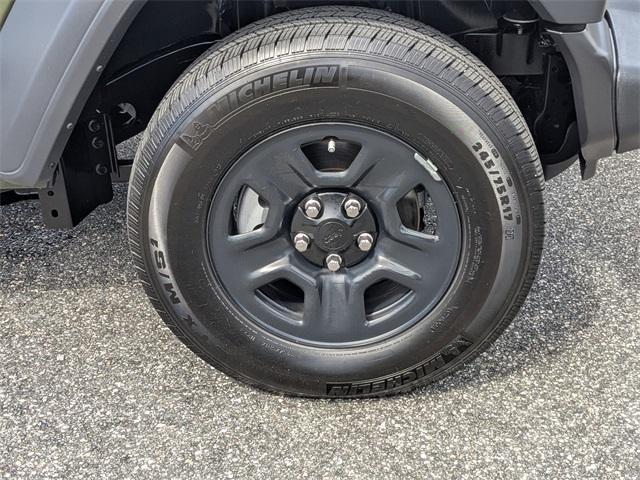 used 2023 Jeep Wrangler car, priced at $31,999