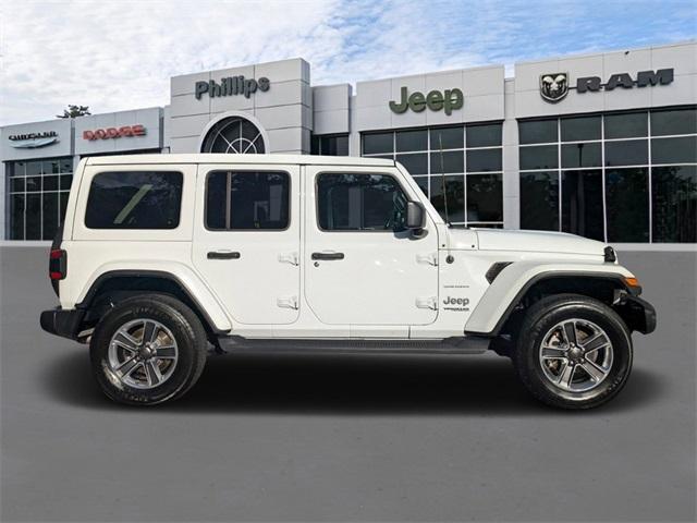 used 2021 Jeep Wrangler Unlimited car, priced at $35,996