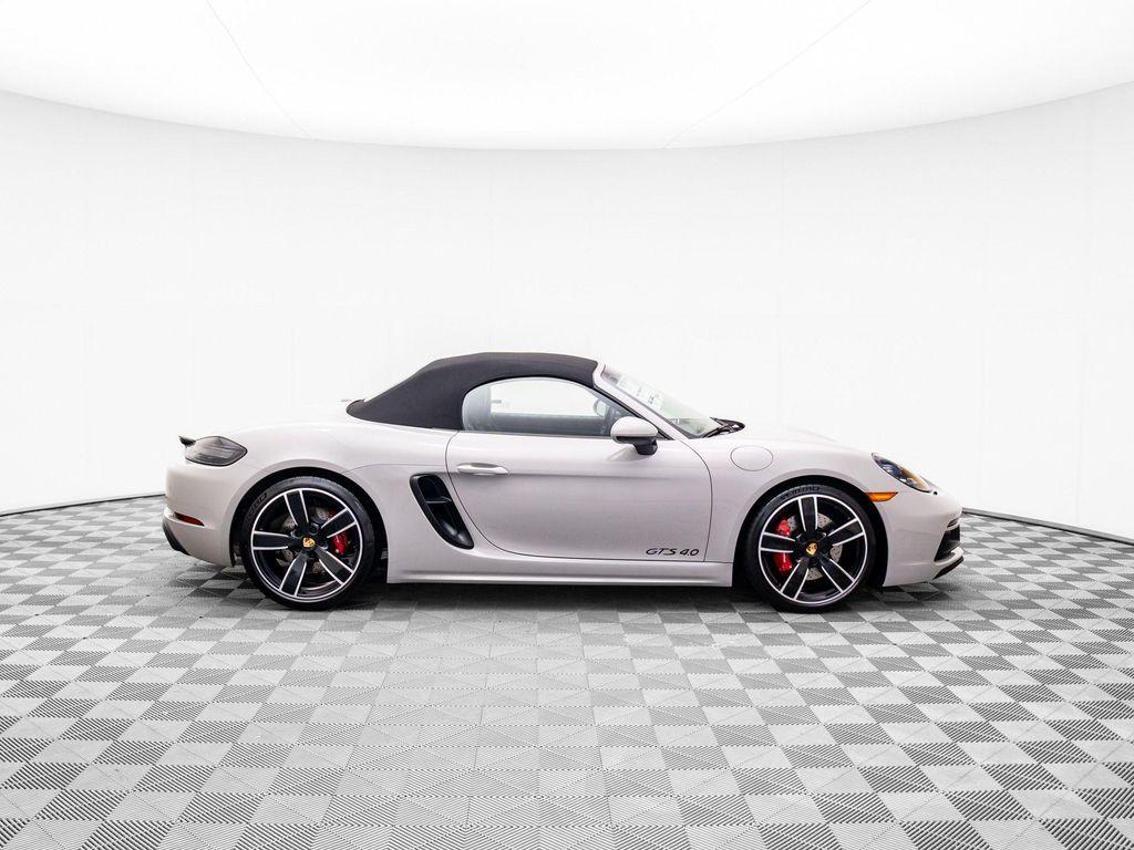 new 2025 Porsche 718 Boxster car, priced at $130,735