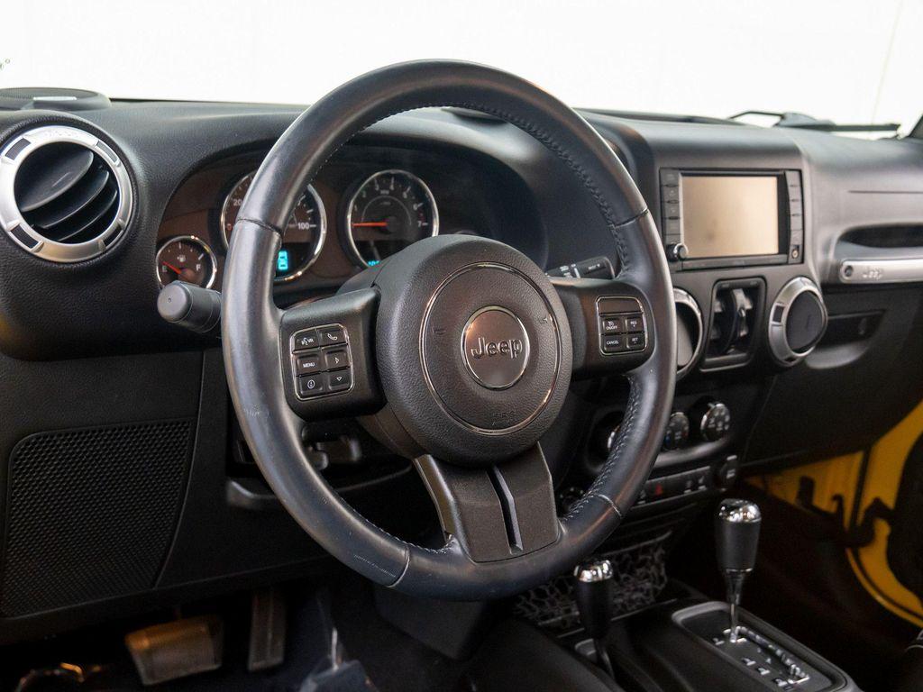 used 2015 Jeep Wrangler Unlimited car, priced at $16,691