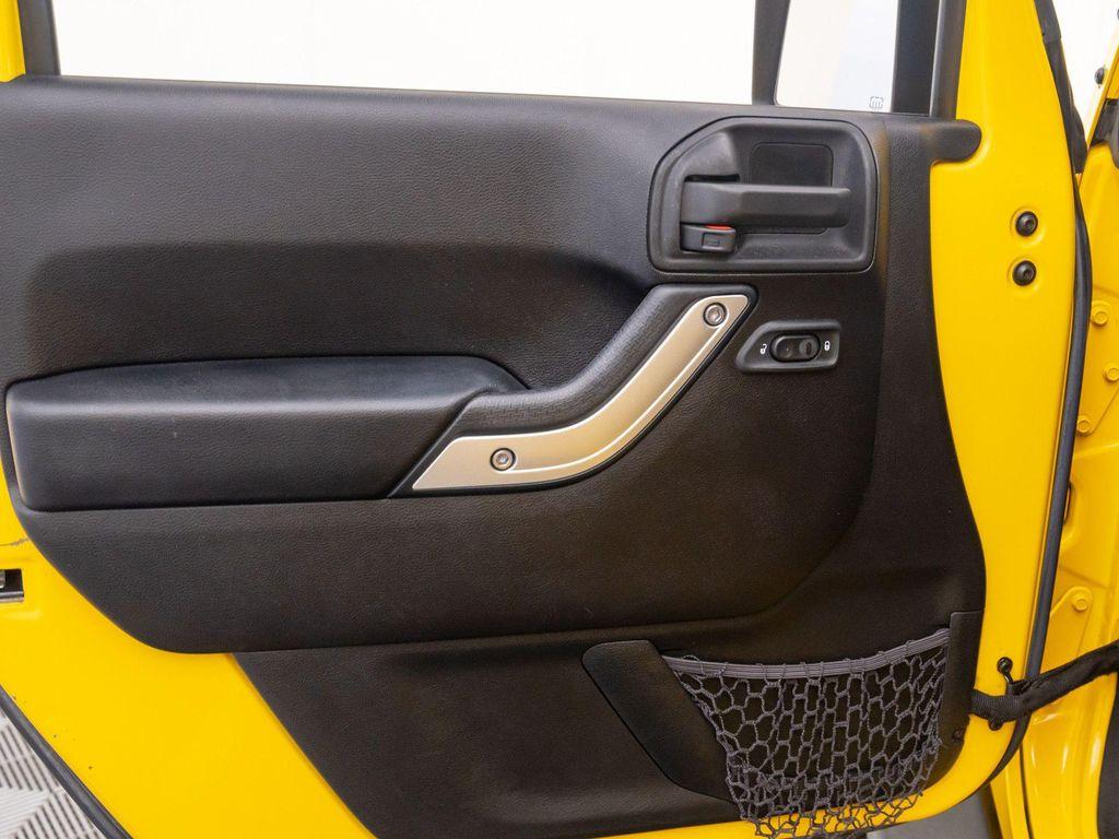 used 2015 Jeep Wrangler Unlimited car, priced at $16,691
