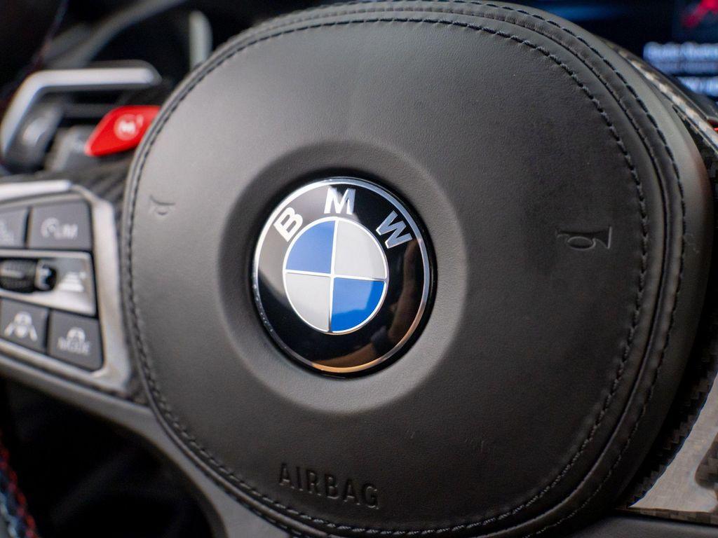 used 2022 BMW M4 car, priced at $66,500