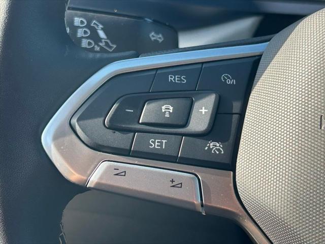 used 2024 Volkswagen Taos car, priced at $24,091