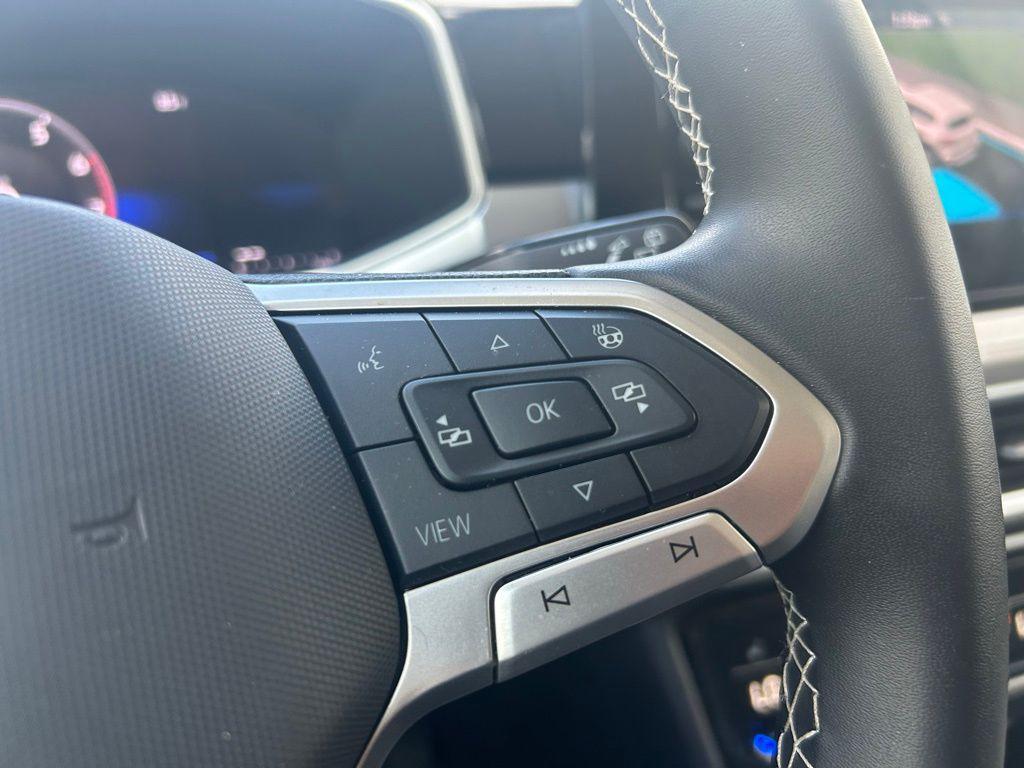 used 2025 Volkswagen Taos car, priced at $25,995