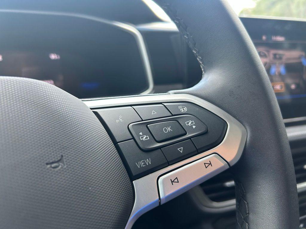 used 2025 Volkswagen Taos car, priced at $26,491