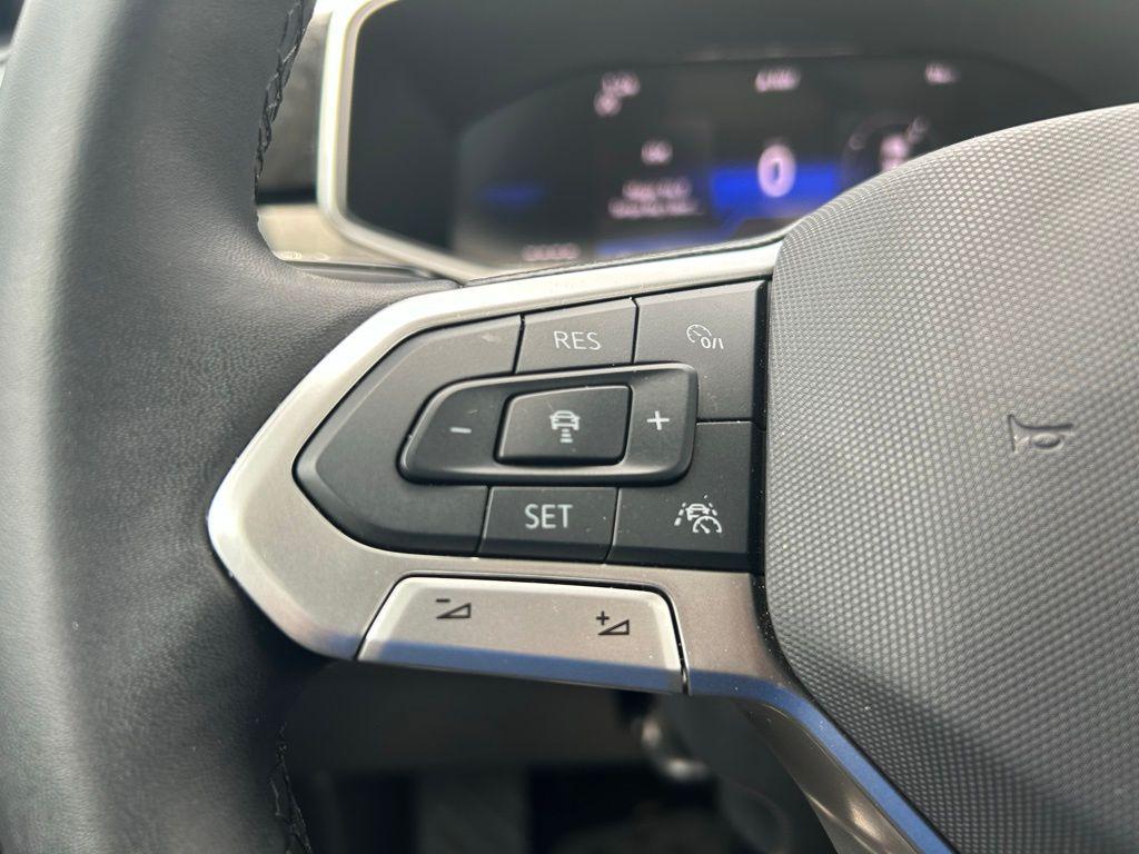 used 2025 Volkswagen Taos car, priced at $26,429