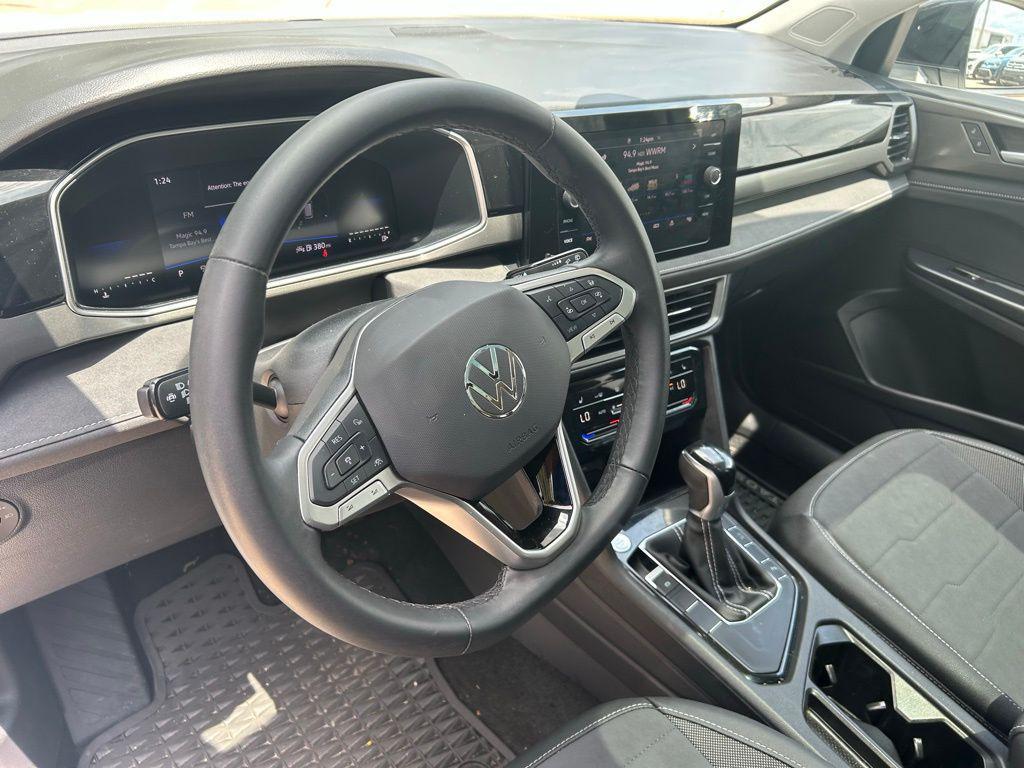 used 2025 Volkswagen Taos car, priced at $26,429