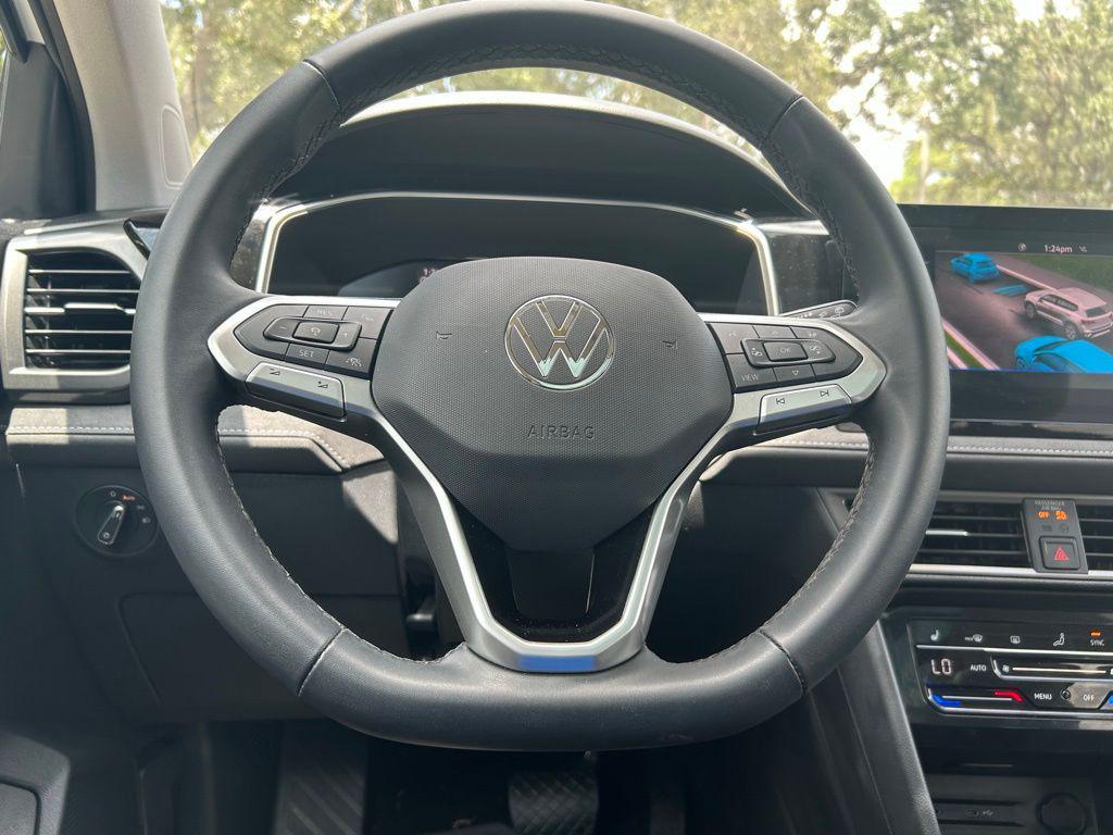 used 2025 Volkswagen Taos car, priced at $26,429