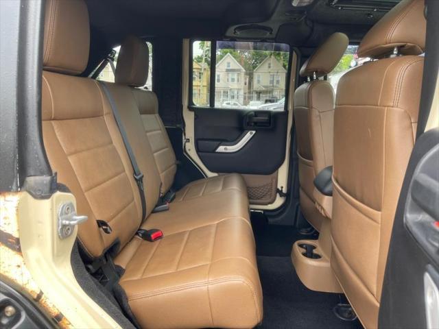 used 2011 Jeep Wrangler Unlimited car, priced at $16,995