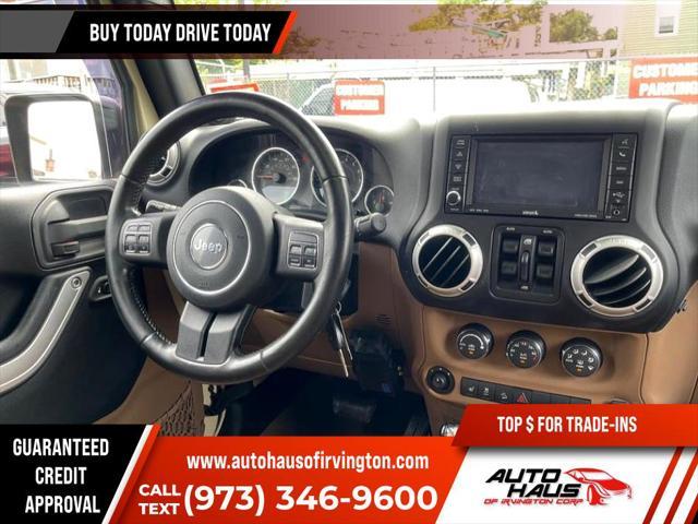 used 2011 Jeep Wrangler Unlimited car, priced at $16,995