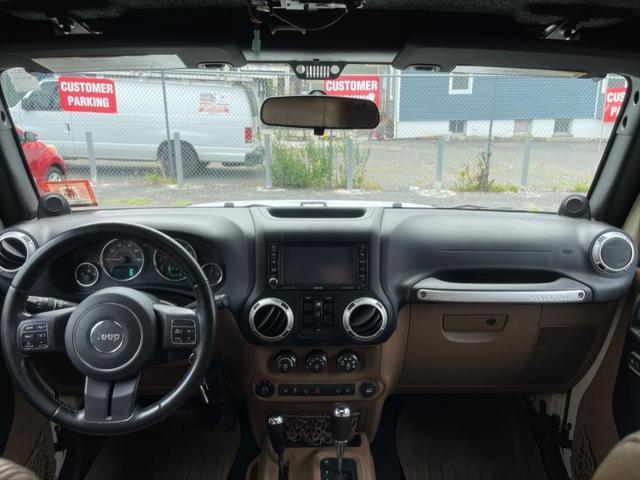 used 2011 Jeep Wrangler Unlimited car, priced at $16,995