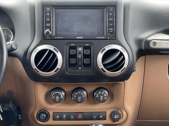 used 2011 Jeep Wrangler Unlimited car, priced at $16,995