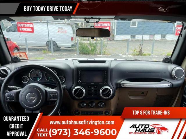 used 2011 Jeep Wrangler Unlimited car, priced at $16,995