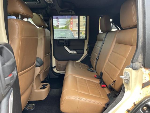 used 2011 Jeep Wrangler Unlimited car, priced at $16,995