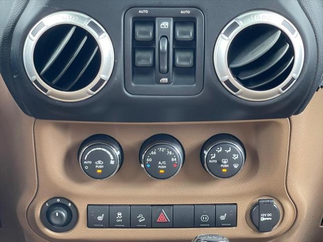 used 2011 Jeep Wrangler Unlimited car, priced at $16,995