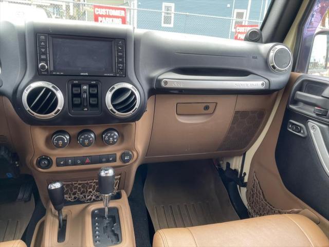 used 2011 Jeep Wrangler Unlimited car, priced at $16,995