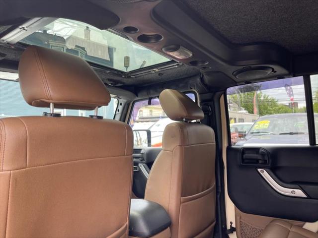 used 2011 Jeep Wrangler Unlimited car, priced at $16,995