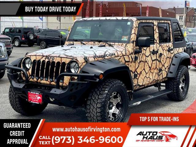 used 2011 Jeep Wrangler Unlimited car, priced at $16,995