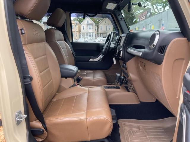 used 2011 Jeep Wrangler Unlimited car, priced at $16,995