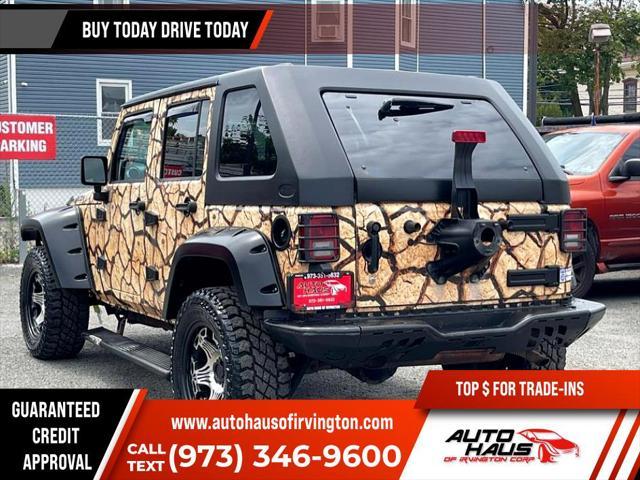 used 2011 Jeep Wrangler Unlimited car, priced at $16,995